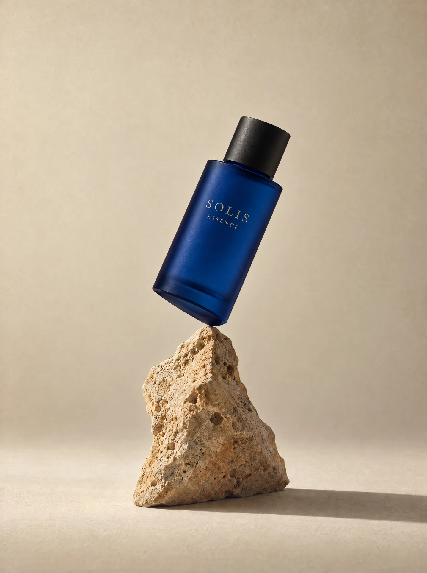 A blue cylindrical bottle on the same plinth