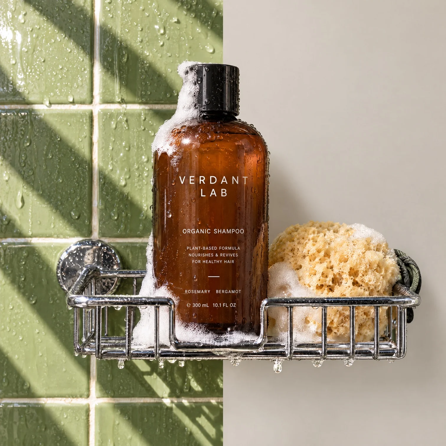 A shampoo bottle on green shower tile and then against a plain cream wall